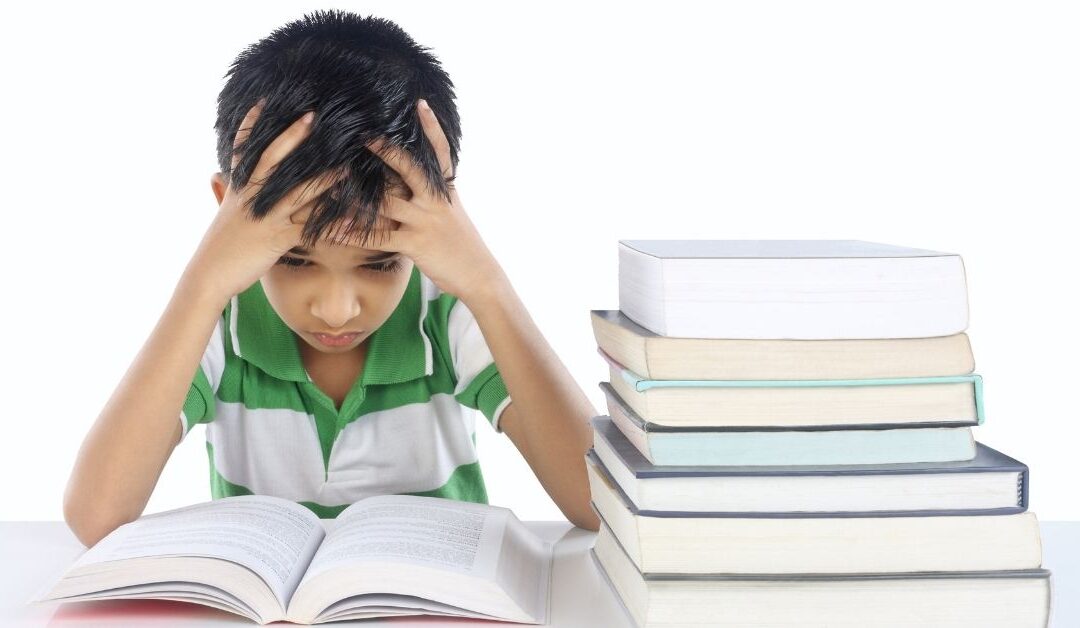 Boy with stack of books