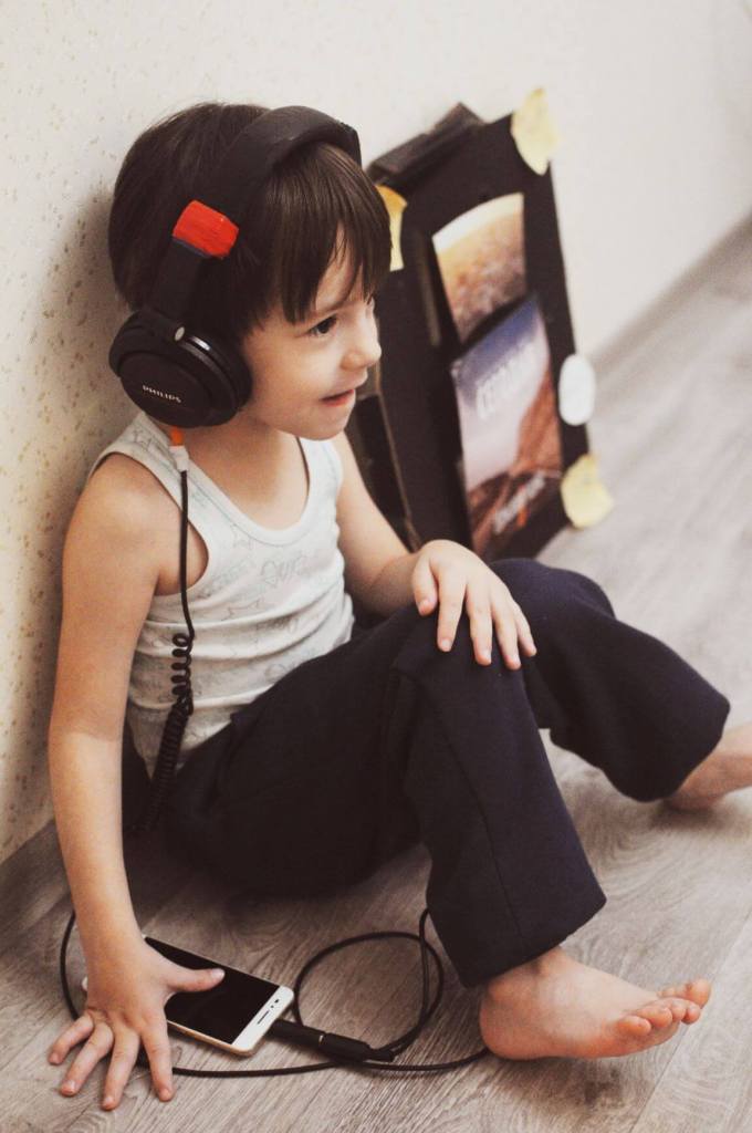 Boy listening to music.