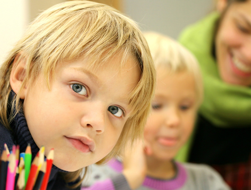 Boy in class. Prepare your child with autism/ADHD for a new school year.