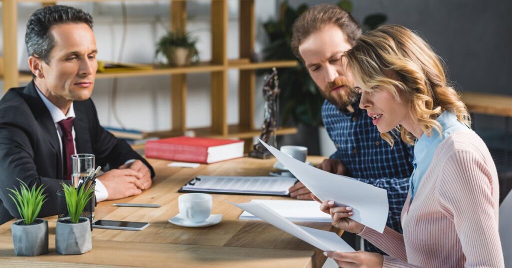 Couple meeting with lawyer. Follow these eight steps to prepare for your autistic child's future