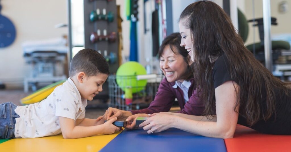 Boy receiving occupational therapy. Which treatments are the right ones for your child with autism and ADHD?