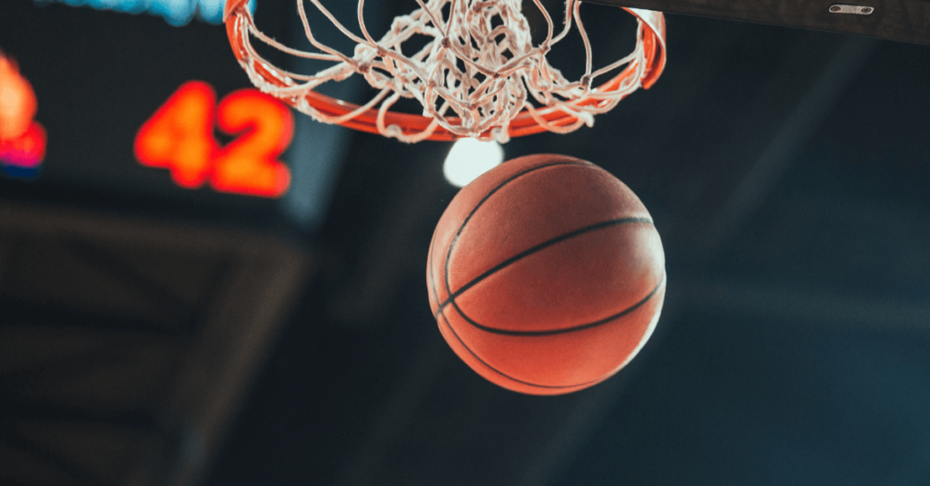 Basketball going through a hoop. Consider Special Olympics for your child with autism.